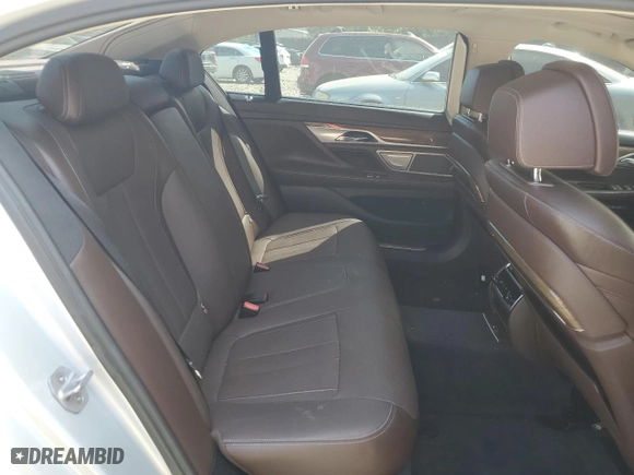 2016 BMW 7 Series 740i with VIN WBA7E2C56GG738760, listed as a Copart auction lot 59668504 with 81,484 mi miles and Salvage Title. Bid and sale history available at carsss.com. Image 10.