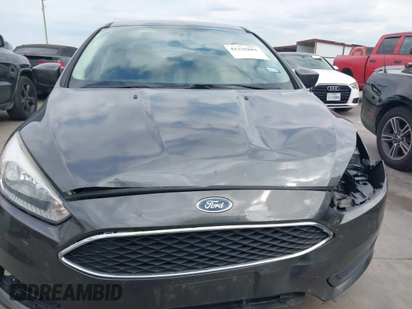 2018 Ford Focus SE with VIN 1FADP3F22JL295342, listed as a IAAI auction lot 42335881 with 77,464 mi miles and . Bid and sale history available at DreamBid. Image 13.