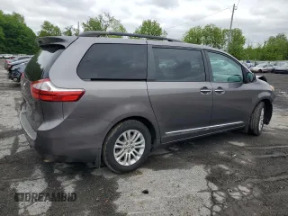 2015 Toyota Sienna XLE with VIN 5TDYK3DC4FS659692, listed as a Copart auction lot 57248355 with 121,644 mi miles and Salvage title. Bid and sale history available at DreamBid. Image 3.