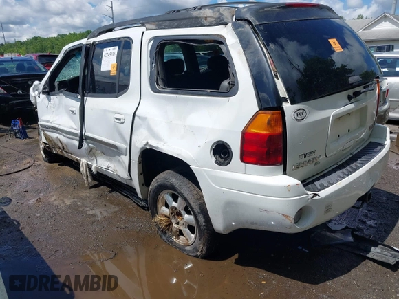 2003 GMC Envoy SLT z VIN 1GKES16S136235222, wystawiony jako IAAI lot #42245115 z przebiegiem Nie podano mil oraz . Historia ofert i sprzedaży dostępna na DreamBid. Obrazek 3.
