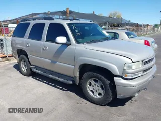 2005 Chevrolet Tahoe LT z VIN 1GNEK13T55R136601, wystawiony jako IAAI lot #41819629 z przebiegiem 220 074 mil mil oraz . Historia ofert i sprzedaży dostępna na DreamBid. Obrazek 1.