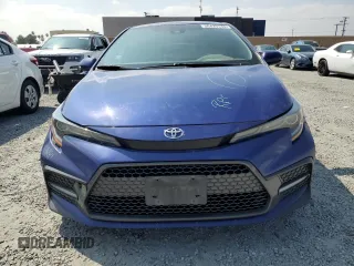 2022 Toyota Corolla SE with VIN 5YFS4MCE8NP106186, listed as a Copart auction lot 50429145 with 54,889 mi miles and Salvage Title. Bid and sale history available at carsss.com. Image 5.