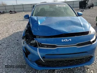 2023 Kia Rio S z VIN 3KPA24AD2PE529734, wystawiony jako Copart lot #48755585 z przebiegiem 99 031 mil mil oraz Szkody całkowita. Historia ofert i sprzedaży dostępna na DreamBid. Obrazek 11.