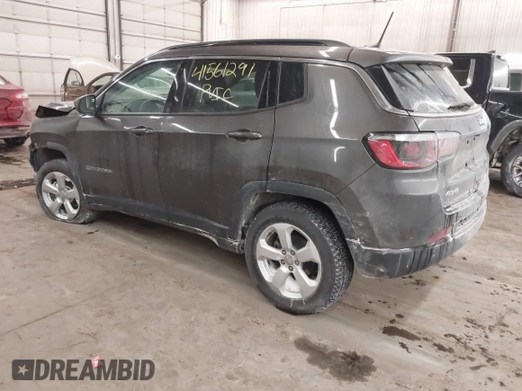 2019 Jeep Compass Altitude with VIN 3C4NJDBBXKT665843, listed as a IAAI auction lot 41561291 with 82,912 mi miles and . Bid and sale history available at DreamBid. Image 3.