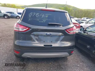 2016 Ford Escape SE with VIN 1FMCU9GX7GUA58243, listed as a IAAI auction lot 41856764 with 50,129 mi miles and . Bid and sale history available at DreamBid. Image 17.