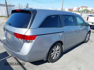 2016 Honda Odyssey SE with VIN 5FNRL5H32GB153002, listed as a IAAI auction lot 42084022 with 63,764 mi miles and . Bid and sale history available at DreamBid. Image 4.