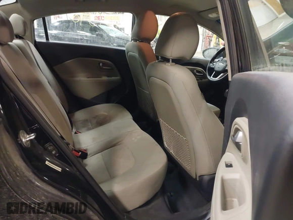 2014 Kia Rio LX with VIN KNADM4A31E6404206, listed as a IAAI auction lot 41543090 with 70,563 mi miles and . Bid and sale history available at DreamBid. Image 8.