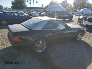 1997 Mercedes-Benz SL-Class with VIN WDBFA63F5VF144026, listed as a Copart auction lot 80580024 with 138,776 mi miles and Clean Title. Bid and sale history available at carsss.com. Image 3.