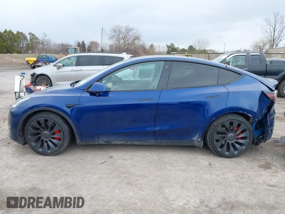 2020 Tesla Model Y Long Range with VIN 5YJYGDEF0LF000380, listed as a IAAI auction lot 41867489 with 66,294 mi miles and . Bid and sale history available at DreamBid. Image 14.