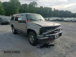 2000 Chevrolet Tahoe Z71 with VIN 1GNEK13R7YR189177, listed as a Copart auction lot 56830725 with 308,270 mi miles and Salvage title. Bid and sale history available at DreamBid. Image 14.