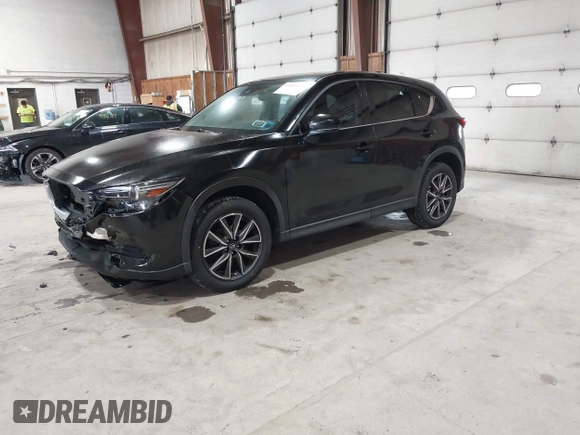 2017 Mazda CX-5 Grand Touring with VIN JM3KFBDL6H0143013, listed as a IAAI auction lot 41912979 with 122,890 mi miles. Bid and sale history available at carsss.com. Image 20.