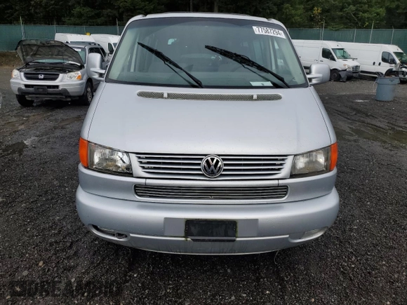 2001 Volkswagen EuroVan MV с VIN WV2MB47031H098986, выставлен на аукционе Copart как лот 77587294 с пробегом 161 046 миль миль и Чистый • Clean title. История ставок и продаж доступна на DreamBid. Изображение 5.