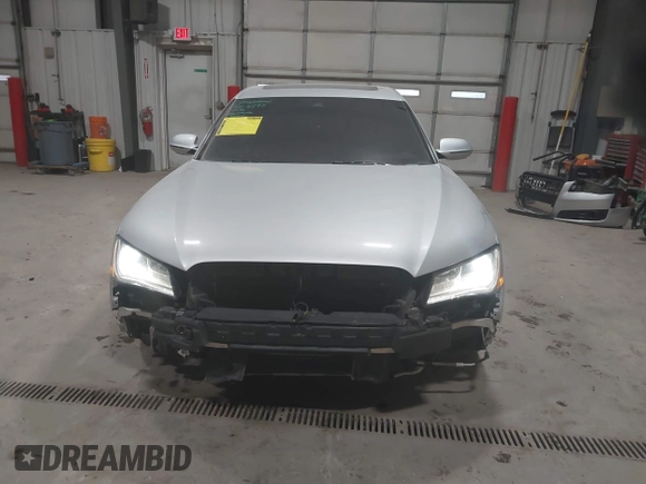 2011 Audi A8 with VIN WAURVAFD5BN014214, listed as a IAAI auction lot 41396044 with 131,764 mi miles and . Bid and sale history available at DreamBid. Image 13.