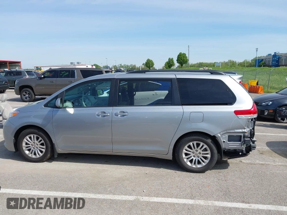 2014 Toyota Sienna XLE with VIN 5TDYK3DC0ES451307, listed as a IAAI auction lot 42093569 with 105,721 mi miles and . Bid and sale history available at DreamBid. Image 15.