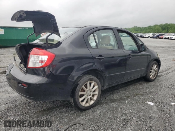 2011 Suzuki SX4 LE z VIN JS2YC5A28B6300625, wystawiony jako Copart lot #54044155 z przebiegiem 179 269 mil mil oraz Szkoda całkowita • Salvage title. Historia ofert i sprzedaży dostępna na DreamBid. Obrazek 3.