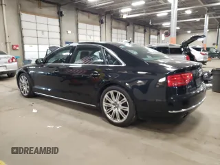 2014 Audi A8 3.0T z VIN WAURGAFD1EN009932, wystawiony jako Copart lot #84607914 z przebiegiem 87 981 mil mil oraz Szkoda całkowita • Salvage title. Historia ofert i sprzedaży dostępna na DreamBid. Obrazek 2.