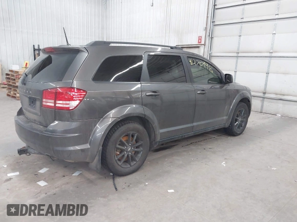 2020 Dodge Journey SE Value with VIN 3C4PDCAB9LT201682, listed as a IAAI auction lot 41270998 with 77,758 mi miles and . Bid and sale history available at carsss.com. Image 4.