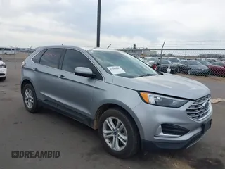 2022 Ford Edge SEL z VIN 2FMPK4J93NBA94793, wystawiony jako IAAI lot #41884687 z przebiegiem 57 372 mil mil oraz . Historia ofert i sprzedaży dostępna na DreamBid. Obrazek 1.