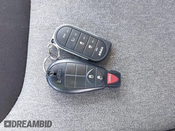 2014 Jeep Cherokee Sport with VIN 1C4PJLAB4EW110051, listed as a IAAI auction lot 41961698 with 153,570 mi miles and . Bid and sale history available at DreamBid. Image 11.