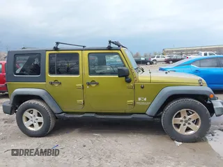 2008 Jeep Wrangler Unlimited X with VIN 1J4GA39158L529523, listed as a IAAI auction lot 41979992 with 304,641 mi miles and . Bid and sale history available at DreamBid. Image 13.