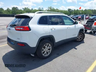 2016 Jeep Cherokee Latitude with VIN 1C4PJLCB0GW291357, listed as a IAAI auction lot 42312356 with 105,692 mi miles and . Bid and sale history available at DreamBid. Image 4.