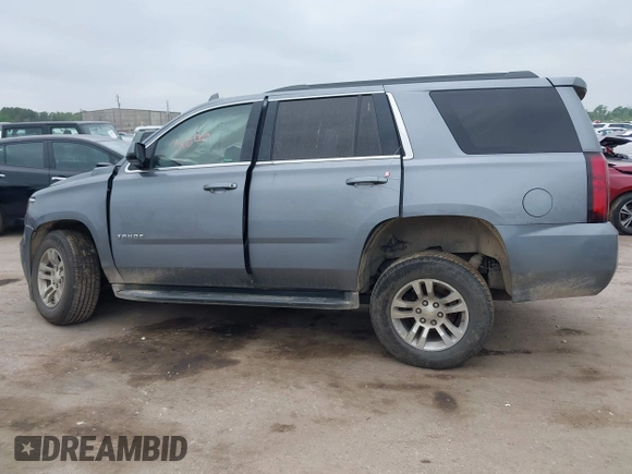 2020 Chevrolet Tahoe LS z VIN 1GNSCAKC3LR101733, wystawiony jako IAAI lot #41912918 z przebiegiem 153 731 mil mil oraz . Historia ofert i sprzedaży dostępna na DreamBid. Obrazek 14.
