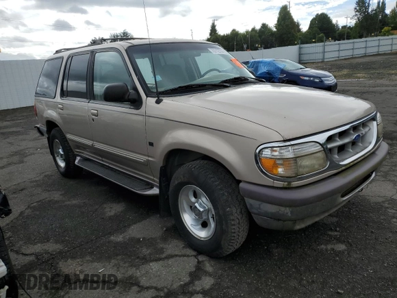 1997 Ford Explorer XLT with VIN 1FMDU35PXVZB69793, listed as a Copart auction lot 70712774 with 138,243 mi miles and Salvage title. Bid and sale history available at DreamBid. Image 4.