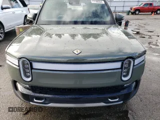 2022 Rivian R1S Launch Edition with VIN 7PDSGABL5NN001035, listed as a Copart auction lot 77188564 with Not Provided miles and Salvage Title. Bid and sale history available at carsss.com. Image 12.
