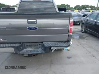 2014 Ford F-150 XL with VIN 1FTFW1CTXEKF35966, listed as a IAAI auction lot 42120360 with 140,174 mi miles and . Bid and sale history available at DreamBid. Image 18.