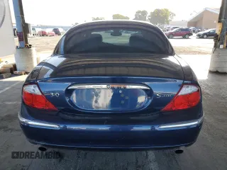 2002 Jaguar S-Type V6 z VIN SAJDA01N92FM22309, wystawiony jako Copart lot #56733435 z przebiegiem 33 224 mil mil oraz Tytuł czysty. Historia ofert i sprzedaży dostępna na DreamBid. Obrazek 6.