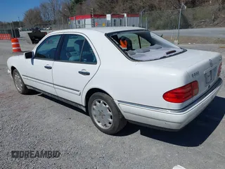 1999 Mercedes-Benz E-Class with VIN WDBJF82H4XX025925, listed as a IAAI auction lot 41839398 with 238,583 mi miles. Bid and sale history available at carsss.com. Image 3.