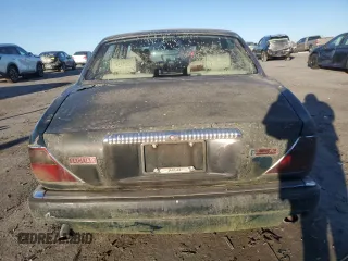1995 Jaguar XJ with VIN SAJKX1747SC722815, listed as a Copart auction lot 83743934 with Not Provided miles and Clean Title. Bid and sale history available at DreamBid. Image 6.