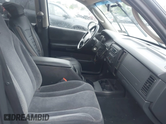 2004 Dodge Dakota SLT with VIN 1D7HG48N04S718220, listed as a IAAI auction lot 42258803 with 250,757 mi miles and . Bid and sale history available at DreamBid. Image 5.