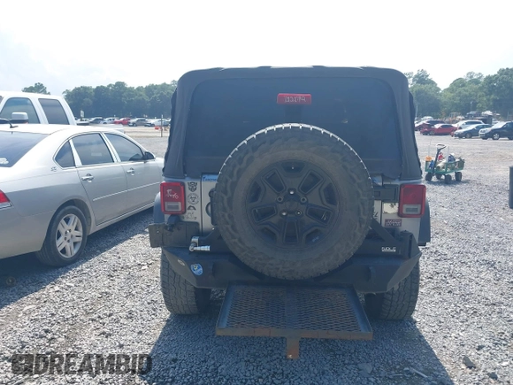 2015 Jeep Wrangler Freedom Edition with VIN 1C4AJWAG4FL589769, listed as a IAAI auction lot 42704488 with 194,414 mi miles and . Bid and sale history available at DreamBid. Image 16.