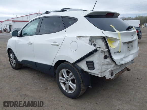 2013 Hyundai Tucson GLS with VIN KM8JU3AC5DU693550, listed as a IAAI auction lot 41919615 with 202,517 mi miles. Bid and sale history available at carsss.com. Image 3.