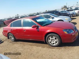 2005 Nissan Altima 2.5 S with VIN 1N4AL11D75N405954, listed as a IAAI auction lot 41643379 with 228,084 mi miles. Bid and sale history available at carsss.com. Image 14.