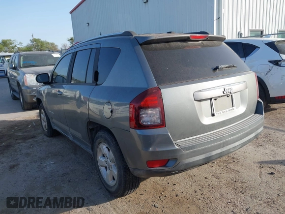 2014 Jeep Compass Sport with VIN 1C4NJCBA6ED620698, listed as a IAAI auction lot 41852056 with 193,085 mi miles and . Bid and sale history available at DreamBid. Image 3.