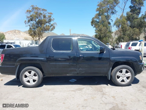 2011 Honda Ridgeline RTL with VIN 5FPYK1F50BB001442, listed as a IAAI auction lot 42023615 with 189,170 mi miles. Bid and sale history available at carsss.com. Image 13.