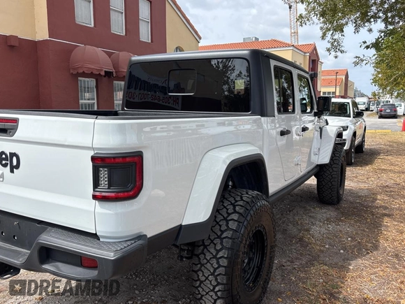 2021 Jeep Gladiator 80th Anniversary with VIN 1C6HJTAG0ML541509, listed as a Copart auction lot 50540975 with 50,754 mi miles and Clean title. Bid and sale history available at DreamBid. Image 4.
