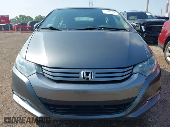 2011 Honda Insight LX z VIN JHMZE2H54BS000481, wystawiony jako IAAI lot #42368258 z przebiegiem 256 894 mil mil oraz . Historia ofert i sprzedaży dostępna na DreamBid. Obrazek 12.