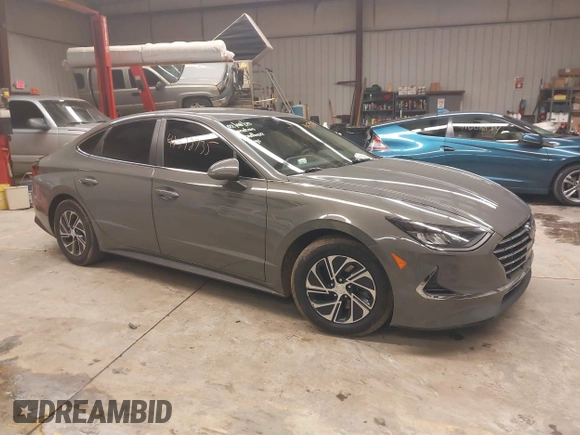 2022 Hyundai Sonata Hybrid Blue with VIN KMHL24JJ3NA048305, listed as a IAAI auction lot 41572735 with 88,085 mi miles. Bid and sale history available at carsss.com. Image 1.