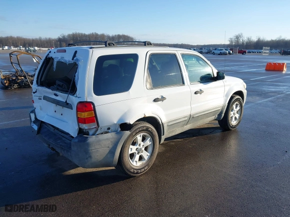 2005 Ford Escape XLT with VIN 1FMYU931X5KA84738, listed as a IAAI auction lot 41663564 with 140,903 mi miles. Bid and sale history available at carsss.com. Image 4.