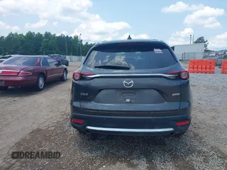 2018 Mazda CX-9 Grand Touring with VIN JM3TCADY7J0217595, listed as a IAAI auction lot 42381331 with 130,604 mi miles and . Bid and sale history available at DreamBid. Image 16.