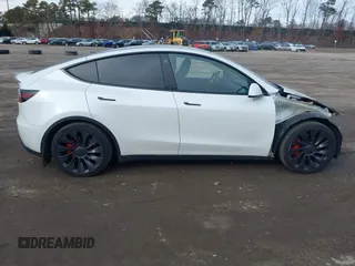 2021 Tesla Model Y Performance with VIN 5YJYGDEF1MF262930, listed as a IAAI auction lot 41606321 with 28,882 mi miles and . Bid and sale history available at DreamBid. Image 13.