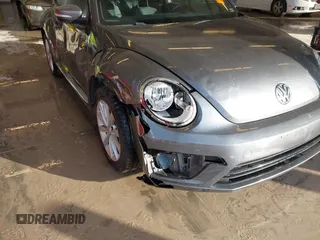 2018 Volkswagen Beetle S with VIN 3VWFD7AT6JM703758, listed as a IAAI auction lot 41381842 with 1 mi miles. Bid and sale history available at carsss.com. Image 6.