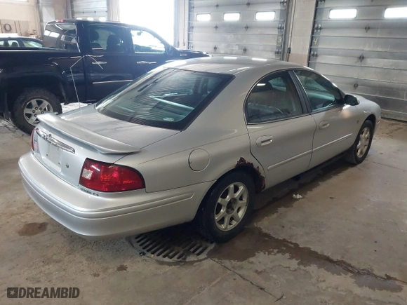 2003 Mercury Sable LS Premium with VIN 1MEFM55S63G621064, listed as a IAAI auction lot 42099656 with 182,862 mi miles. Bid and sale history available at carsss.com. Image 4.