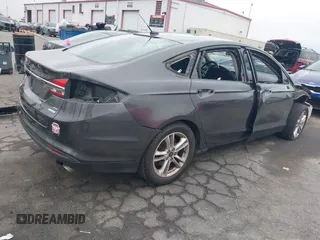 2018 Ford Fusion SE with VIN 3FA6P0HD8JR268055, listed as a IAAI auction lot 42151813 with 83,306 mi miles and . Bid and sale history available at carsss.com. Image 4.
