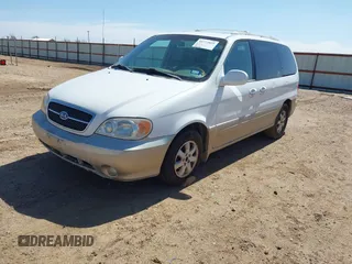 2004 Kia Sedona LX with VIN KNDUP131646596077, listed as a IAAI auction lot 41772025 with 236,282 mi miles. Bid and sale history available at carsss.com. Image 2.
