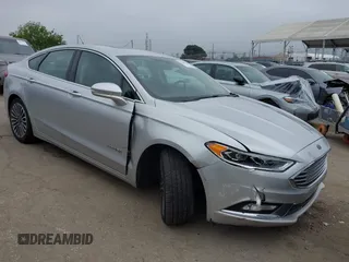 2017 Ford Fusion Hybrid Titanium с VIN 3FA6P0RU7HR300311, выставлен на аукционе IAAI как лот 42045664 с пробегом 136 231 миль миль и . История ставок и продаж доступна на DreamBid. Изображение 1.