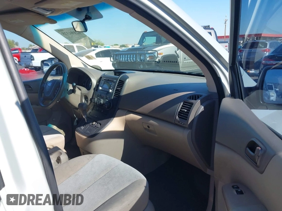 2012 Kia Sedona LX with VIN KNDMG4C71C6494271, listed as a IAAI auction lot 42194375 with 96,404 mi miles and . Bid and sale history available at DreamBid. Image 5.